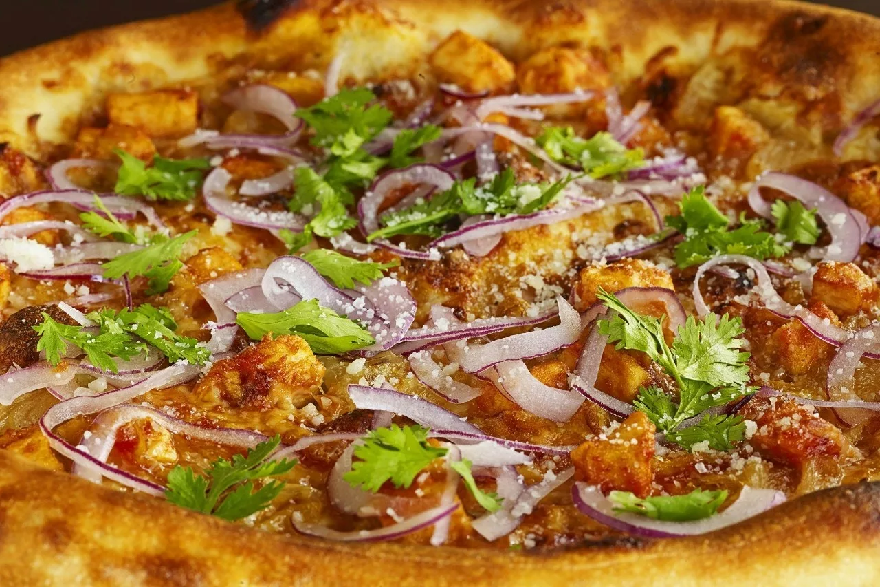 close up of a bbq chicken pizza