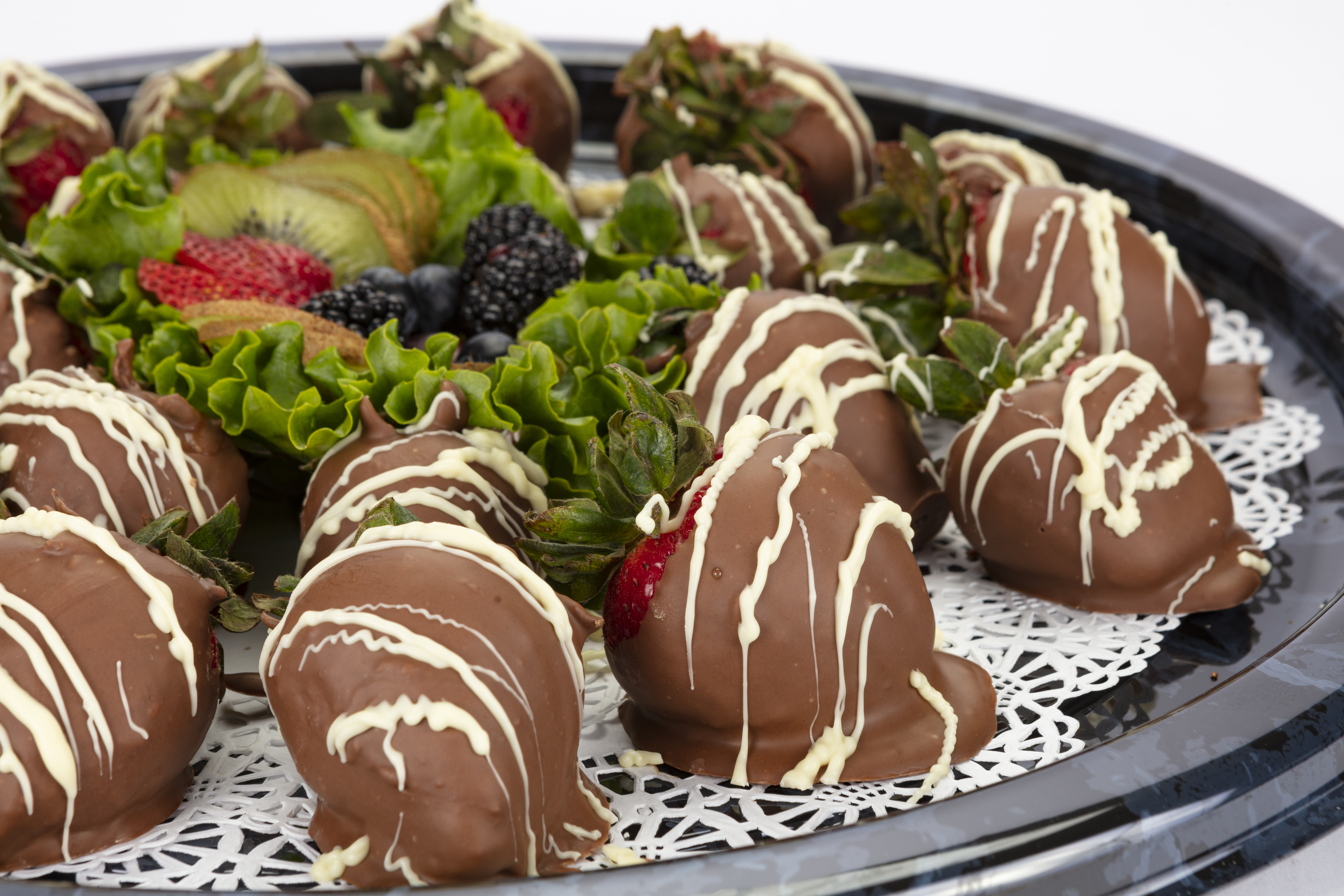 chocolate covered strawberries on a platter