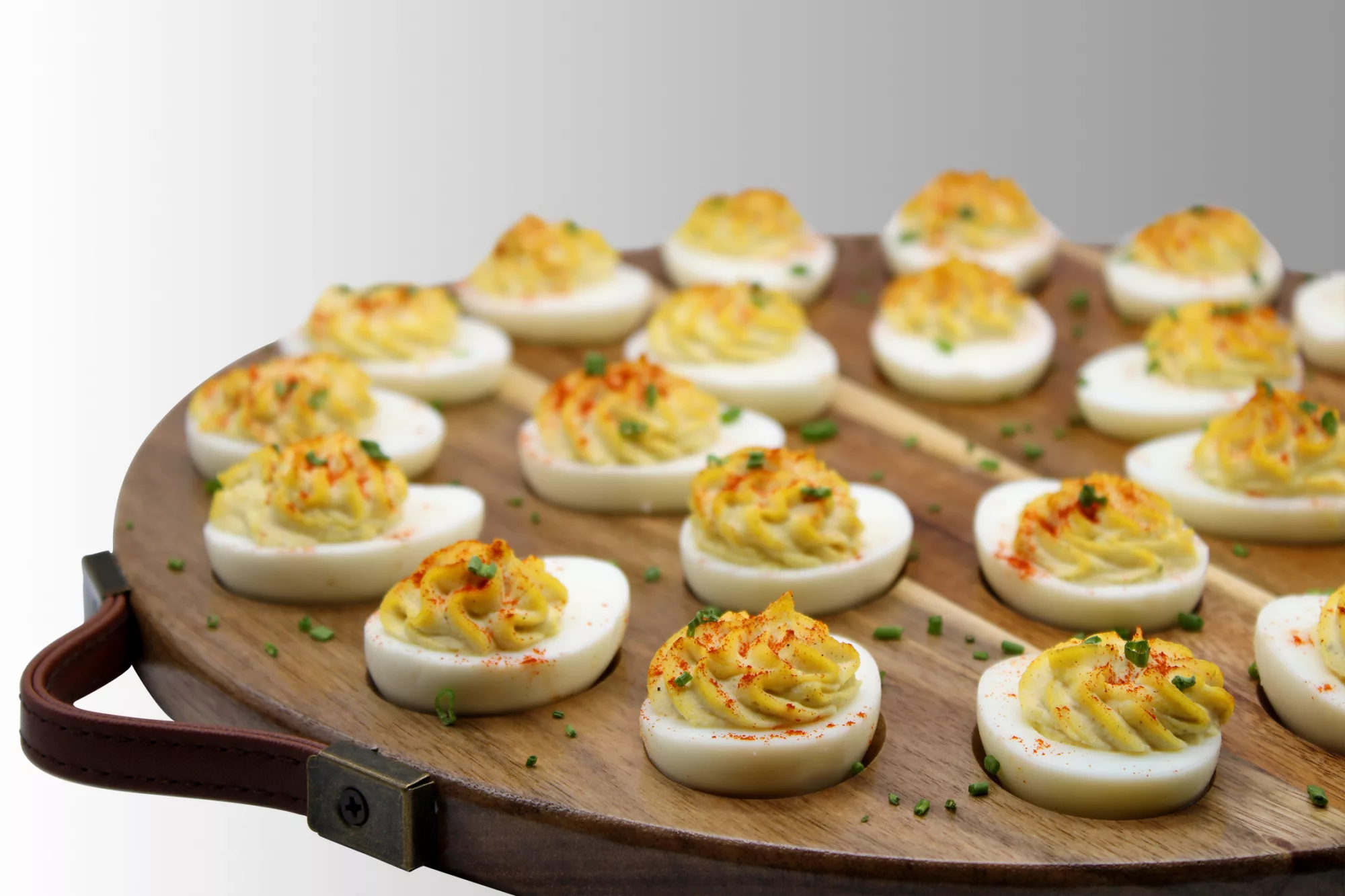 Hard boiled egg whites stuffed with a creamy spiced egg yolk filling. Includes 24 pieces.